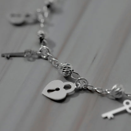 Pulsera de Candado Corazón con Bola Slash de Plata 925
